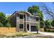 Charming exterior showcasing meticulous design with modern touches and a well-kept yard at 550 W Cama St, Charlotte, NC 28217