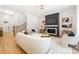 Comfortable living room with a fireplace, neutral tones, and plenty of natural light at 550 W Cama St, Charlotte, NC 28217