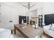 Serene office space with white walls, dark trim, and ample natural light at 550 W Cama St, Charlotte, NC 28217