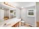 Well-lit bathroom with a vanity, sink, toilet, and bath/shower at 6350 Mount Pleasant S Rd, Concord, NC 28025