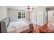 Comfortable bedroom with large window and view to yard at 6350 Mount Pleasant S Rd, Concord, NC 28025