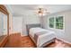 Cozy bedroom with ample sunlight, comfortable bed, and closet at 6350 Mount Pleasant S Rd, Concord, NC 28025