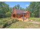 Rear exterior showcasing a deck and patio, perfect for enjoying outdoor gatherings and relaxation at 6350 Mount Pleasant S Rd, Concord, NC 28025