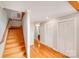 Bright hallway with hardwood floors, staircase, and access to other rooms at 6350 Mount Pleasant S Rd, Concord, NC 28025
