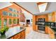 A modern kitchen with stainless steel appliances and an open layout to the living room at 6350 Mount Pleasant S Rd, Concord, NC 28025