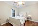 Cozy bedroom with hardwood floors and window providing natural light at 6722 Elmstone Dr, Charlotte, NC 28277