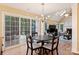 Bright breakfast nook with a view to the deck and lush backyard at 6722 Elmstone Dr, Charlotte, NC 28277