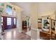 Grand foyer with hardwood floors, a soaring arched window above the front door, and inviting living spaces at 6722 Elmstone Dr, Charlotte, NC 28277