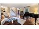 Spacious living area with hardwood floors, comfortable seating, and ample natural light at 6722 Elmstone Dr, Charlotte, NC 28277