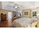 Spacious main bedroom suite featuring a stone fireplace and a sitting area at 6722 Elmstone Dr, Charlotte, NC 28277