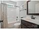 This bathroom has a single sink vanity, a toilet, and a shower-tub combination with stylish shower curtain at 7006 Nesbit Rd, Waxhaw, NC 28173