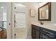 This bathroom offers a shower/tub combo and neutral decor for a bright, clean look at 7006 Nesbit Rd, Waxhaw, NC 28173
