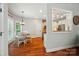 Charming breakfast nook with wooden table and chairs, open to kitchen at 7006 Nesbit Rd, Waxhaw, NC 28173