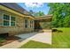 Charming brick home featuring a screened-in porch and patio, perfect for outdoor living at 7006 Nesbit Rd, Waxhaw, NC 28173