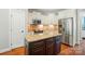 Kitchen featuring stainless steel appliances, granite countertops and a center island at 7006 Nesbit Rd, Waxhaw, NC 28173