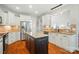 Spacious kitchen featuring a center island, stainless steel appliances, and ample cabinet space at 7006 Nesbit Rd, Waxhaw, NC 28173