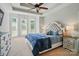 Spacious main bedroom with tray ceiling, large windows, and neutral decor at 7006 Nesbit Rd, Waxhaw, NC 28173