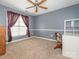 A spacious bedroom with carpeted floor, chair, desk, dresser and natural light at 725 Old State Sw St, Concord, NC 28027