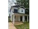 Charming two-story home featuring a welcoming front porch with white columns and a modern color scheme at 760 3Rd Street Sw Pl, Hickory, NC 28602