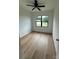 Bright bedroom featuring a modern ceiling fan and natural light at 804 3Rd Street Sw Pl, Hickory, NC 28602