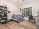 Bedroom with a bed, desk, chair, and a large window, perfect for a  at 805 Brookmont Ave, Salisbury, NC 28146