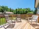 Relaxing backyard wooden deck area with comfortable seating, overlooking the grassy yard at 805 Brookmont Ave, Salisbury, NC 28146