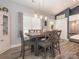 Bright dining area with hardwood floors and stylish furnishings, located off of the kitchen at 805 Brookmont Ave, Salisbury, NC 28146
