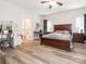 Spacious main bedroom with a large window, wood furniture, and ensuite bathroom at 805 Brookmont Ave, Salisbury, NC 28146