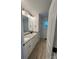 Modern bathroom featuring double vanity, granite countertops, and contemporary fixtures at 807 S Bostian St, China Grove, NC 28023
