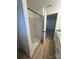 Stylish bathroom with walk-in shower, vinyl flooring, and neutral decor at 807 S Bostian St, China Grove, NC 28023