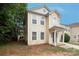 Two-story home with an arched window and covered front porch at 8432 Spirea Ct, Charlotte, NC 28215