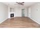 Spacious living room with wood floors, a fireplace, and neutral paint at 8432 Spirea Ct, Charlotte, NC 28215