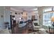 Inviting living room features open layout with modern kitchen, and comfortable seating arrangements at 9062 Treetop Nw Way, Concord, NC 28027