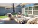 Charming outdoor patio with comfortable seating, decorative plants, and a relaxing ambiance for outdoor living at 9062 Treetop Nw Way, Concord, NC 28027