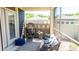 Cozy screened-in patio with comfortable seating, a stylish egg chair, and a view of the outdoor space at 9062 Treetop Nw Way, Concord, NC 28027