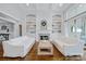 Bright living room with built-in shelving, a cozy fireplace, and neutral decor at 9807 Aristides Dr, Waxhaw, NC 28173