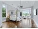 Spacious main bedroom with bay window, hardwood floors, tray ceilings and sitting area at 9807 Aristides Dr, Waxhaw, NC 28173