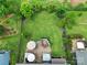 Overhead aerial view of a spacious, landscaped backyard with a patio, hot tub, and seating area at 998 Emory Ln, Fort Mill, SC 29708