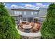 Cozy backyard with a fire pit, comfortable seating, and a serene outdoor space at 998 Emory Ln, Fort Mill, SC 29708