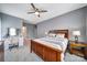 Comfortable bedroom features neutral colors, natural light, carpeted floors, and a ceiling fan at 998 Emory Ln, Fort Mill, SC 29708
