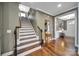 Foyer featuring hardwood floors, a staircase, and access to a living area at 998 Emory Ln, Fort Mill, SC 29708