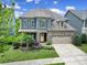 Charming home with stone accents, a well-manicured lawn, and inviting curb appeal at 998 Emory Ln, Fort Mill, SC 29708