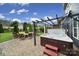 Backyard hot tub with pergola and patio seating area, perfect for outdoor entertaining at 998 Emory Ln, Fort Mill, SC 29708