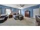 Main bedroom with sitting area, tray ceilings, and a decorative wooden chest at 998 Emory Ln, Fort Mill, SC 29708