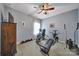 Bright workout room features carpeted floors, ceiling fan, and a variety of exercise equipment at 998 Emory Ln, Fort Mill, SC 29708