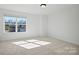Bright bedroom with large window offering natural light and views of the neighborhood at 1048 Waxhaw Crossing Dr # 261, Waxhaw, NC 28173
