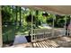 Inviting front porch with lush landscaping and views of the surrounding greenery at 109 Pepper Cir, Mooresville, NC 28117