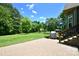 View of a backyard featuring a lush lawn and patio at 114 Wingard Rd, Concord, NC 28025