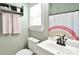 Bathroom featuring a decorative shower curtain, vanity, toilet, and functional design, offering a clean aesthetic at 114 Wingard Rd, Concord, NC 28025