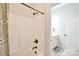 This bathroom features a shower, classic faucet, and functional design, offering a clean aesthetic at 114 Wingard Rd, Concord, NC 28025